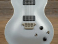 SDC-33 Solid Double Cutaway  Silvertop 2011 Indonesie, Alu Max Connect bridge, Twin CoAxe pickups, body front.
