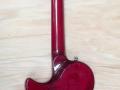 SSC 33 Solid Single Cutaway  Transparant-Red 2011 Indonesie Alu Max Connect bridge, Twin CoAxe pickups, back.