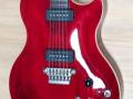 SSC 33 Solid Single Cutaway  Transparant-Red 2011 Indonesie Alu Max Connect bridge, Twin CoAxe pickups, body front.